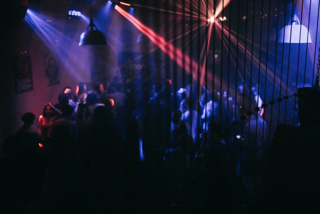 a group of people in a dark room